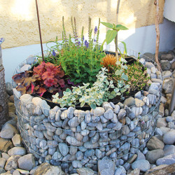 Jardinière en acier ronde gabion 81 x 81 x 40 cm avec galets