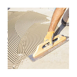 Colles et joints pour sol extérieur.